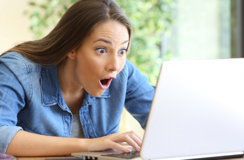 Amazed-entrepreneur-working-on-line.jpg